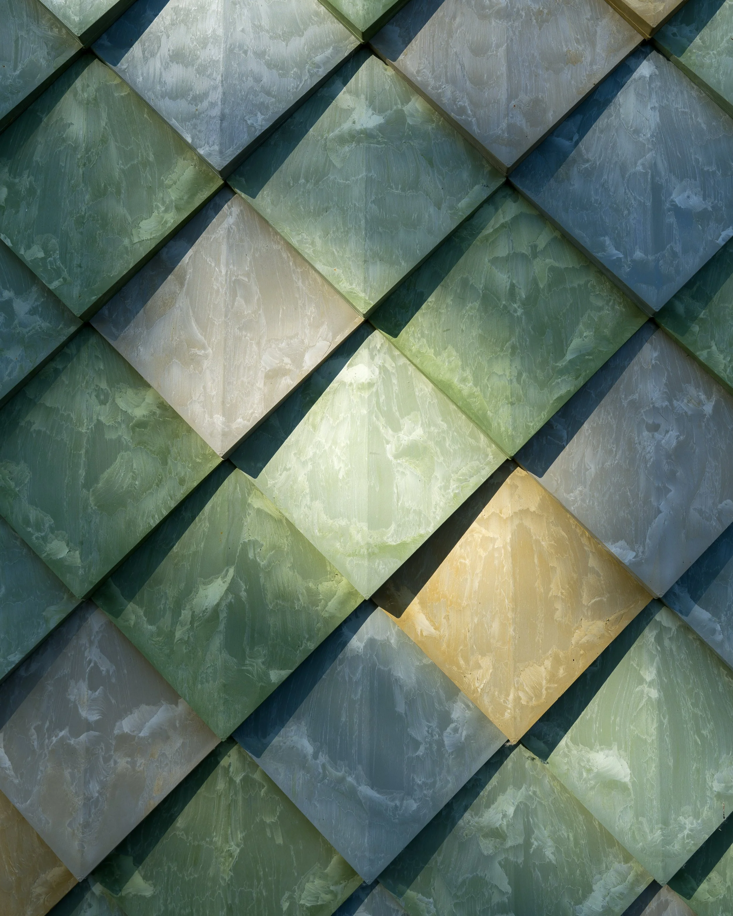 Detail of recycled cladding on the renovated Lensen building – Pretty Plastic First One tiles.