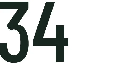 Close-up of the number 34 in black font.