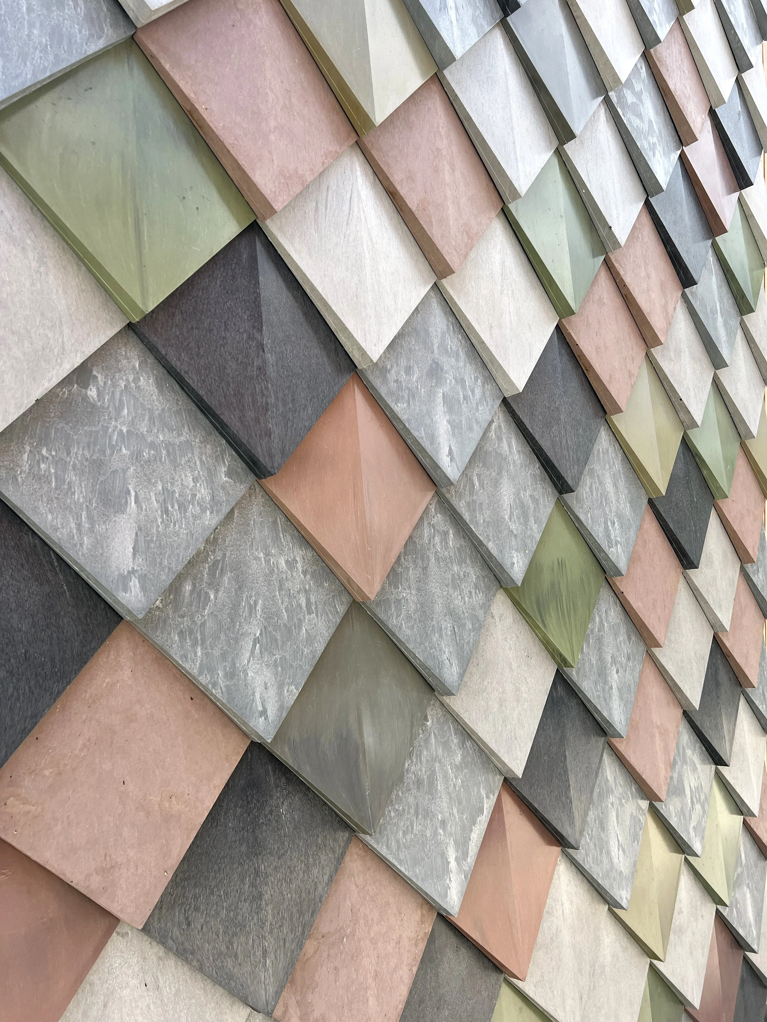 Pretty Plastic façade tiles integrated into the modular houses by MOOS 