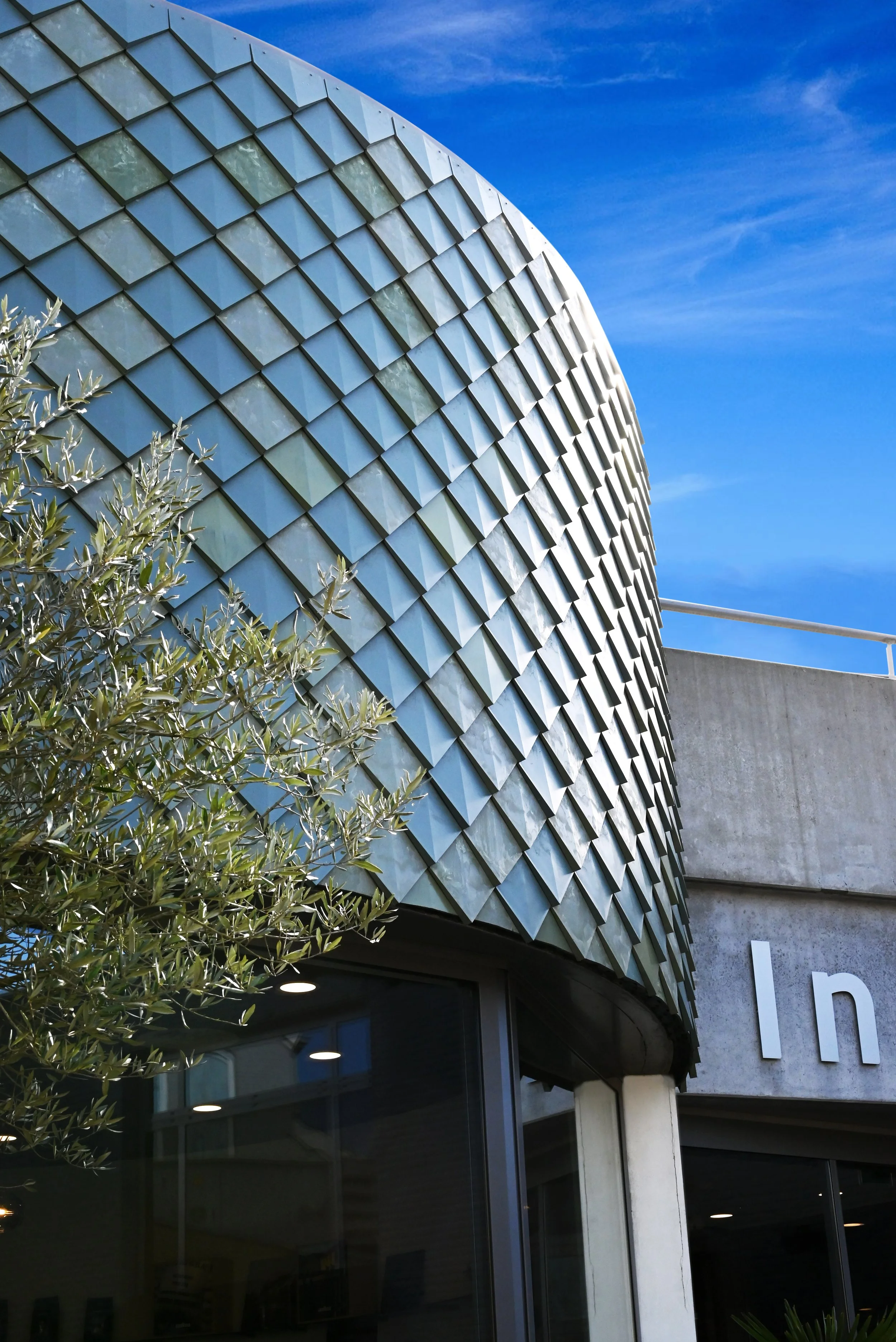 Round facade with Pretty Plastic Tiles