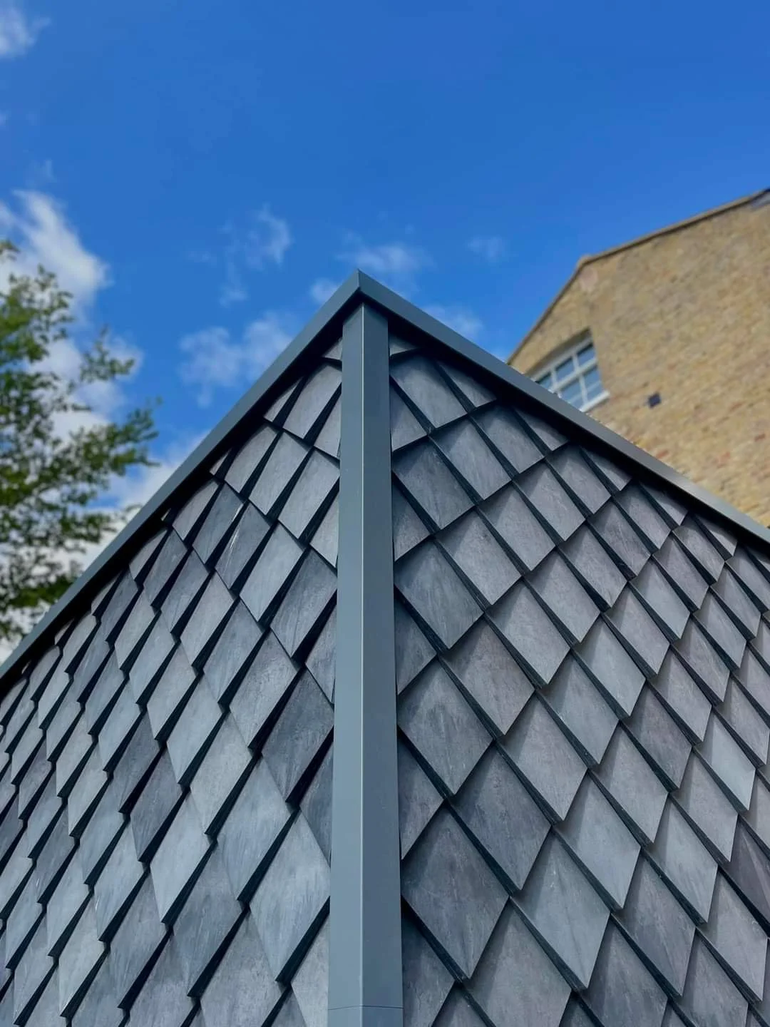 Finc Office London England with Pretty Plastic First One tiles corner solution