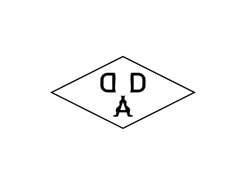 A diamond-shaped road sign with the letters 'D' and 'A' displayed prominently inside
